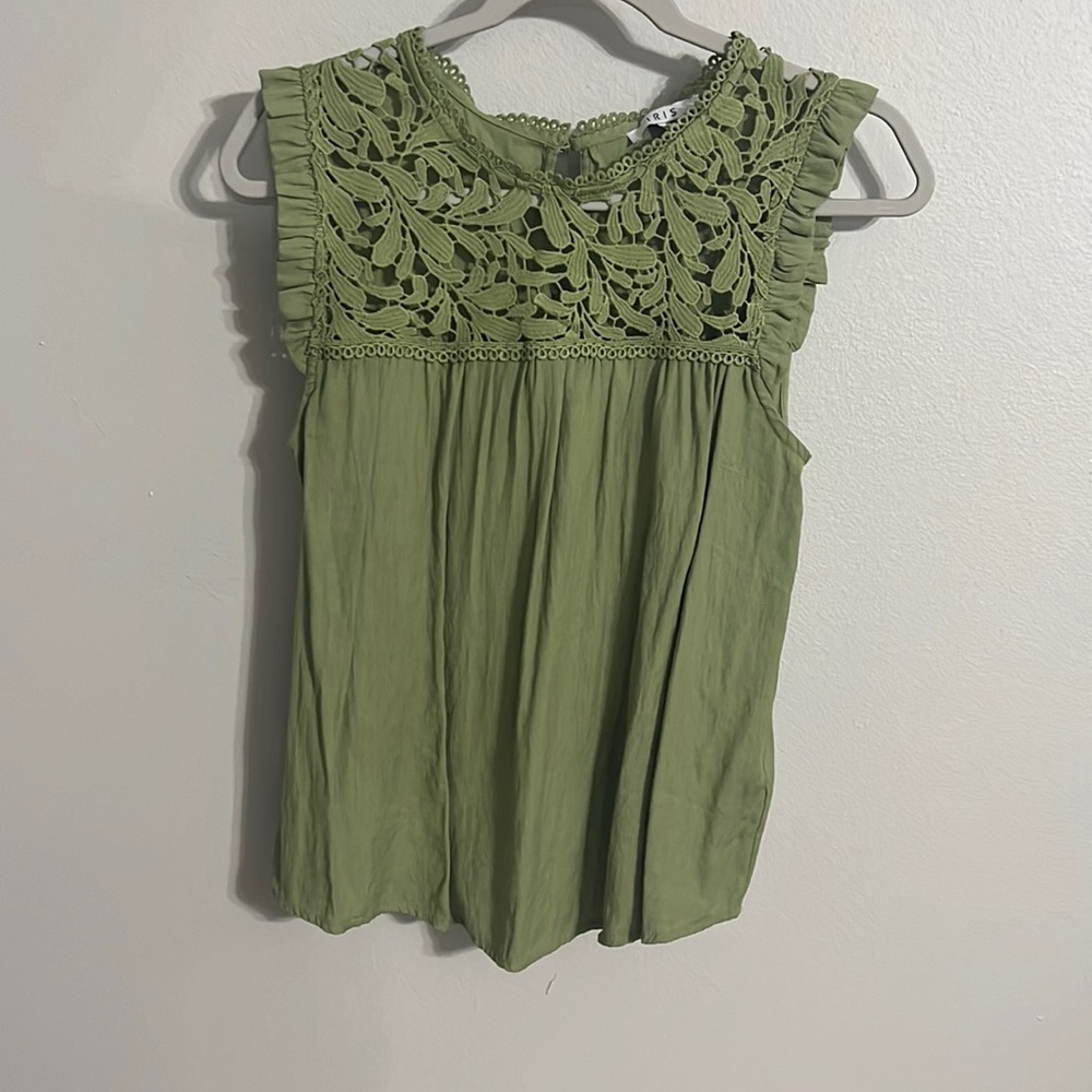 Green sleeveless blouse